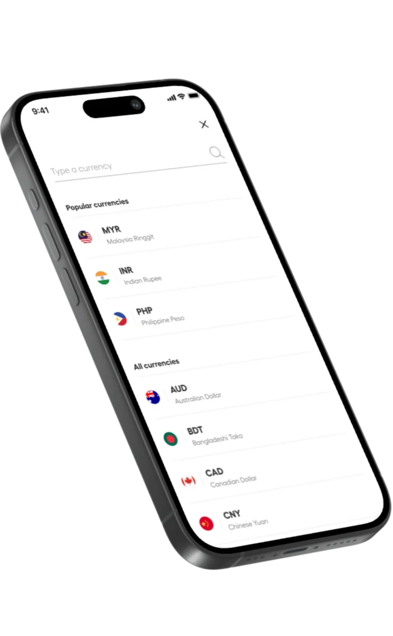 Smartphone screen showing a currency converter app with a list of currencies and small flags (MYR, INR, PHP, AUD, etc.). It’s tilted to the left.